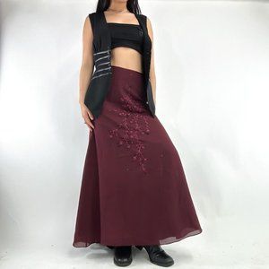 vintage beaded and floral  embroidered skirt with center back zipper closure.